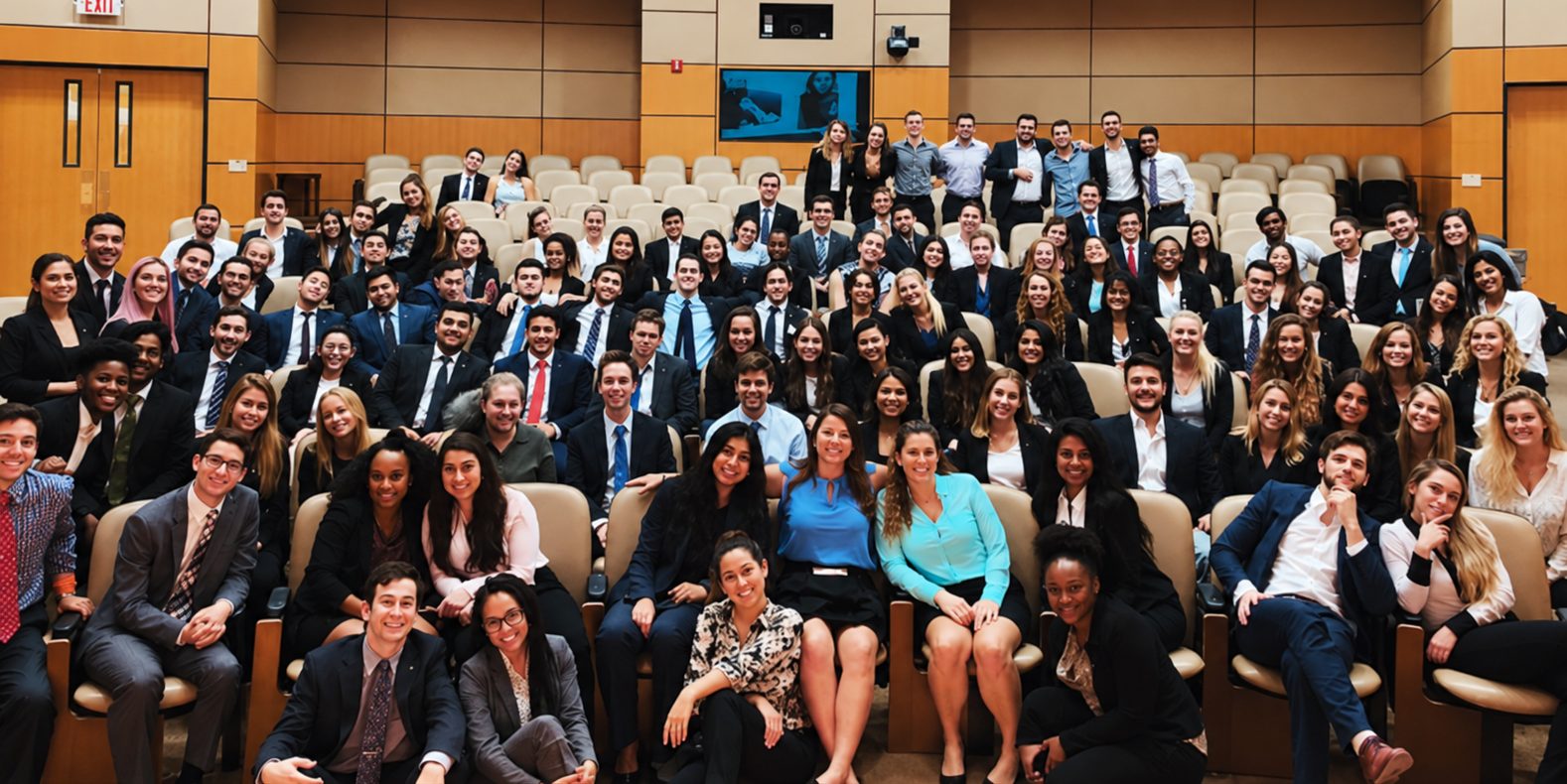 Beta Pi brothers in a lecture hall