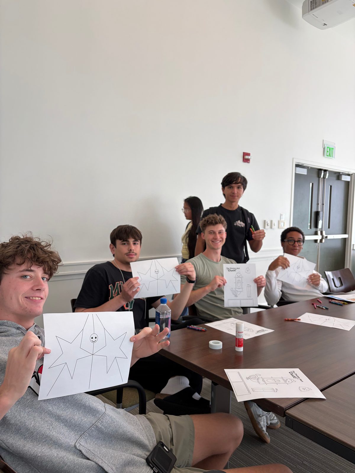 Brothers making cards at a service event